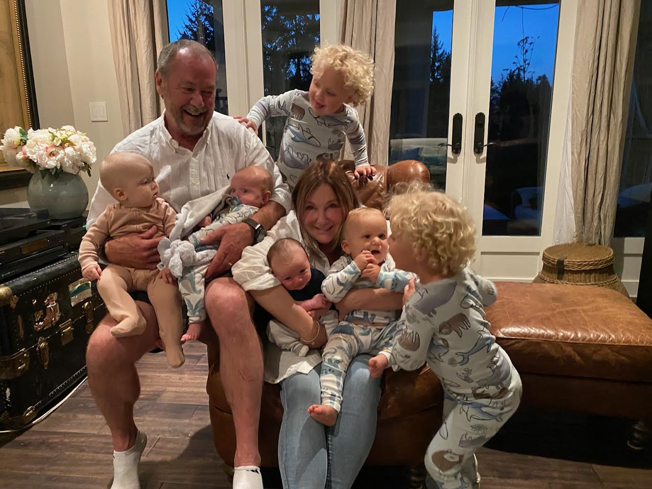 Don Hatton joyfully playing with his grandkids